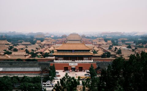 white and brown concrete building during daytime